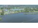Expansive aerial view of a waterfront community with breathtaking views and lush greenery at 8927 Key West Island Way, Riverview, FL 33578