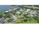 Beautiful waterfront homes in a desirable neighborhood, mature landscaping, and community amenities at 8927 Key West Island Way, Riverview, FL 33578