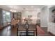 Spacious kitchen with white cabinets, a large island, and a breakfast nook nearby at 8927 Key West Island Way, Riverview, FL 33578