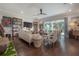 Spacious living room with stylish furnishings, hardwood floors, and abundant natural light at 8927 Key West Island Way, Riverview, FL 33578