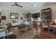 Cozy living room with stylish decor, hardwood floors, and comfortable seating arrangements at 8927 Key West Island Way, Riverview, FL 33578