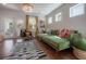 Spacious living room provides comfortable seating and has outside access to the outdoor porch at 8927 Key West Island Way, Riverview, FL 33578