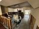 Renovating kitchen features white cabinets and stainless-steel appliances at 9025 1St Ne St, St Petersburg, FL 33702
