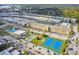 An aerial view of waterfront condos with amenities including pool, tennis courts, shuffleboard courts and boat slips at 1 Boca Ciega Point Blvd # 310, St Petersburg, FL 33708