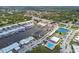 Aerial view of condo near boat docks, tennis courts, pool, and convenient parking at 1 Boca Ciega Point Blvd # 310, St Petersburg, FL 33708