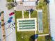 Aerial of shuffleboard court and condo with convenient parking, promoting leisurely outdoor activities at 1 Boca Ciega Point Blvd # 310, St Petersburg, FL 33708