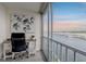 Balcony with desk, chair and expansive water views at 1 Boca Ciega Point Blvd # 310, St Petersburg, FL 33708