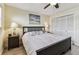 Comfortable bedroom with a queen bed, soft lighting, and a closet for ample storage at 1 Boca Ciega Point Blvd # 310, St Petersburg, FL 33708