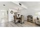 Inviting dining area with a glass table, wicker chairs, and stylish decor at 1 Boca Ciega Point Blvd # 310, St Petersburg, FL 33708