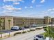 Well-maintained multi-story building with ample parking and mature landscaping at 1 Boca Ciega Point Blvd # 310, St Petersburg, FL 33708