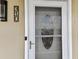 Unit 310 features a decorative front door with a glass window and a stylish black door number plate at 1 Boca Ciega Point Blvd # 310, St Petersburg, FL 33708