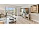 Bright and airy living area with waterfront views from the large balcony at 1 Boca Ciega Point Blvd # 310, St Petersburg, FL 33708