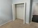 Bedroom closet with shelving at 10766 Standing Stone Dr, Wimauma, FL 33598