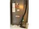 Image of a Lennox HVAC system with visible piping and service labels at 10766 Standing Stone Dr, Wimauma, FL 33598