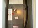 Image of a Lennox HVAC system with visible piping and service labels at 10766 Standing Stone Dr, Wimauma, FL 33598