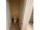Small toilet area with toilet at 10766 Standing Stone Dr, Wimauma, FL 33598