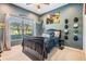 Stylish bedroom with window overlooking front yard at 12745 Moorish Pl, Spring Hill, FL 34610