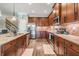 Modern kitchen with stainless steel appliances, granite countertops, and sleek cabinetry at 12745 Moorish Pl, Spring Hill, FL 34610
