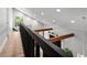 Hallway showcasing modern design, natural light, and wood beam accents at 1304 Withlacoochee St, Safety Harbor, FL 34695