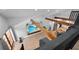 Open living room featuring exposed wood beams, a large television and plentiful natural light at 1304 Withlacoochee St, Safety Harbor, FL 34695