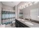 Bathroom featuring double sinks and decorative accents at 13213 Haystack Ct, Riverview, FL 33579