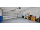 Spacious two car garage ready to store your vehicles and all of your tools at 13213 Haystack Ct, Riverview, FL 33579