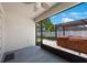Screened patio leading to a backyard with pergola and hot tub, perfect for relaxation at 13213 Haystack Ct, Riverview, FL 33579