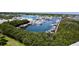 Aerial view of the boat marina nestled among lush greenery, with boats docked at 1332 Pasadena S Ave # 208, South Pasadena, FL 33707