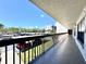Take in the sights from this community balcony with views of the parking area at 1332 Pasadena S Ave # 208, South Pasadena, FL 33707