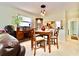 Cozy dining area with furnishings and a dining table at 1332 Pasadena S Ave # 208, South Pasadena, FL 33707