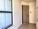 Inviting entry to the residence featuring a well-lit foyer and neutral tones at 1332 Pasadena S Ave # 208, South Pasadena, FL 33707