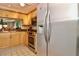 Modern kitchen featuring stainless steel appliances and granite countertops at 1332 Pasadena S Ave # 208, South Pasadena, FL 33707