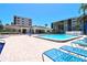 Relax and unwind by the sparkling community pool with ample seating at 1332 Pasadena S Ave # 208, South Pasadena, FL 33707
