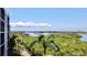 Enjoy incredible views from this unit of lush greenery, a marina, and boats at 1332 Pasadena S Ave # 208, South Pasadena, FL 33707