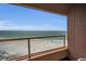 Balcony view overlooking a pristine sandy beach and the ocean at 1340 Gulf Blvd # 16A, Clearwater Beach, FL 33767