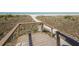 Stairway to a pristine beach with sugar sand and clear water at 1340 Gulf Blvd # 16A, Clearwater Beach, FL 33767
