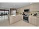 Well-lit kitchen featuring modern stainless-steel appliances at 1340 Gulf Blvd # 16A, Clearwater Beach, FL 33767