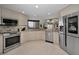 Spacious kitchen with stainless steel appliances and granite countertops at 1340 Gulf Blvd # 16A, Clearwater Beach, FL 33767