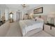 Spacious main bedroom featuring modern furniture, carpeting, and ample natural light at 1340 Gulf Blvd # 16A, Clearwater Beach, FL 33767