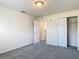 Bedroom featuring carpet, closet, and natural light from a window at 14137 Wake Robin Dr, Brooksville, FL 34604