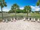 Well-maintained community pool area featuring patio and lounge chairs at 14137 Wake Robin Dr, Brooksville, FL 34604