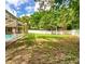 Spacious backyard with a well-maintained lawn and privacy fence, perfect for outdoor activities at 14273 Nugent Circle, Spring Hill, FL 34609