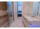 Elegant bathroom with granite counters, vanity, toilet, and glass enclosed shower at 15101 Kestrelglen Way, Lithia, FL 33547