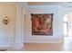 Hallway with elegant tapestry and architectural features at 15101 Kestrelglen Way, Lithia, FL 33547