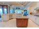 Expansive kitchen featuring a center island, stainless steel appliances, and ample cabinet space at 15101 Kestrelglen Way, Lithia, FL 33547