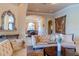 Cozy living room showcasing the archway to the dining room and elegant decor at 15101 Kestrelglen Way, Lithia, FL 33547