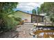 Backyard featuring a pond and outdoor living spaces at 166 11Th N Ave, Safety Harbor, FL 34695