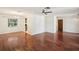 Open floor plan living room featuring hardwood floors and neutral paint at 166 11Th N Ave, Safety Harbor, FL 34695