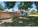 This charming backyard is fenced in and has lush landscaping, offering privacy and a peaceful outdoor area at 1810 77Th N Ave, St Petersburg, FL 33702