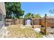 Backyard with a storage shed and wooden fence; providing a private outdoor space at 1810 77Th N Ave, St Petersburg, FL 33702